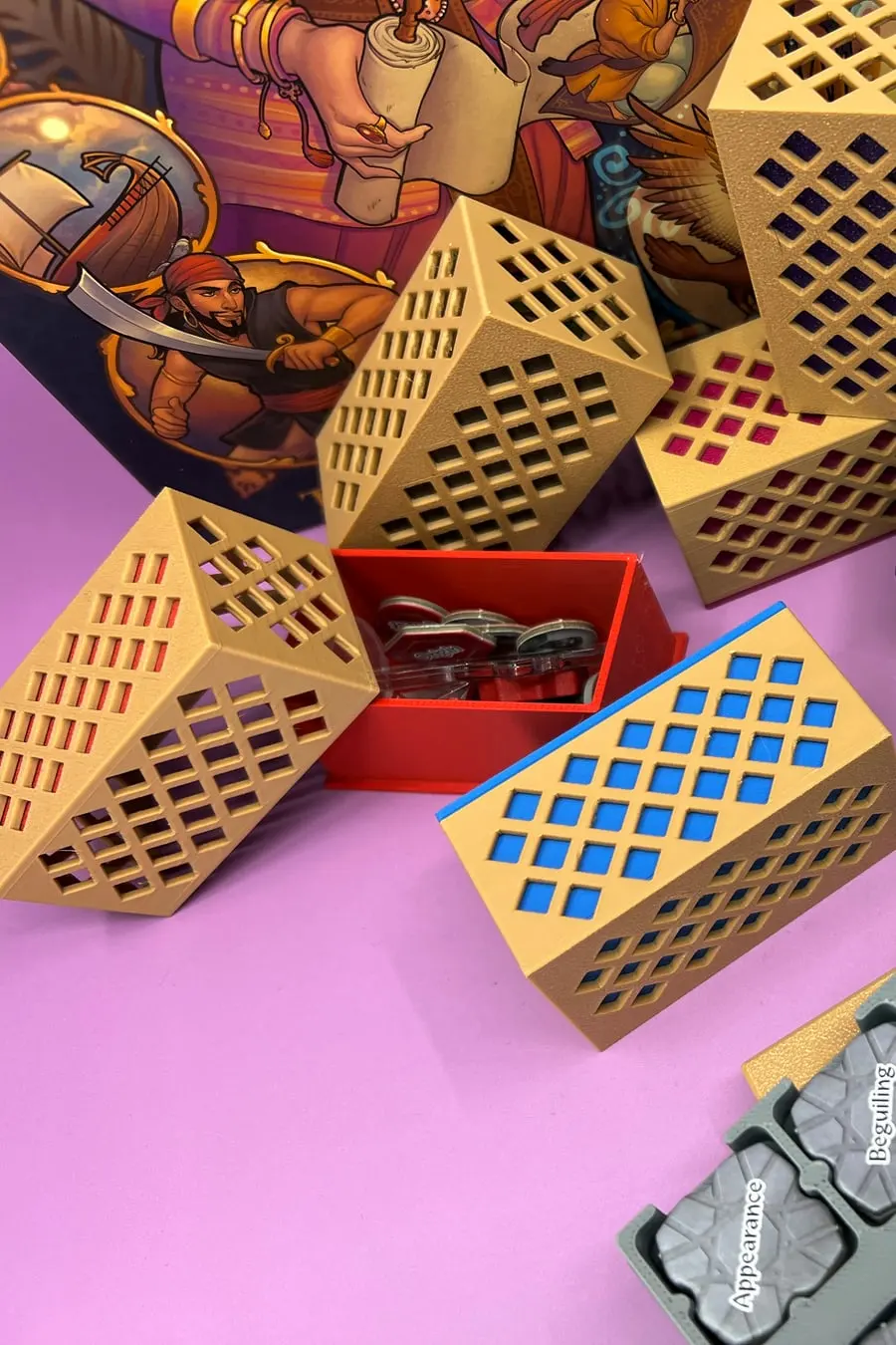 Printed lattice boxes for Tales of the Arabian Nights, in sand and blue.